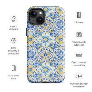 The Blue Mirage for iPhone by Statement Cases features a dual-layered, impact-resistant polycarbonate exterior with a TPU inner liner. Inspired by traditional Portuguese tiles, the blue and yellow patterned case boasts an intricate design of floral and geometric motifs. With its elegant and colorful appearance, the phone's camera is visible at the top left of the case.