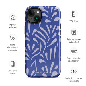 An iPhone encased in the "Mariposa Azul" by Statement Cases, featuring a blue design with an abstract white leaf pattern. The case combines curved and pointed shapes and provides dual-layer protection with TPU lining and impact-resistant polycarbonate. Camera lenses and other top elements remain unobstructed, and "Statement Cases" is inscribed at the bottom.