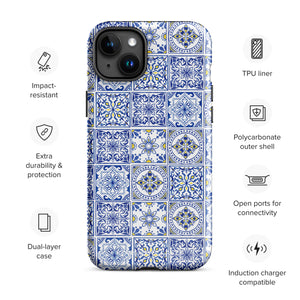 The Lisboa Azul for iPhone by Statement Cases is a smartphone adorned with a dual-layer protection phone case, featuring an intricate blue and white tile pattern. The design showcases various geometric and floral motifs, forming a visually appealing mosaic effect. The impact-resistant camera lenses and flash are prominently visible at the top left.