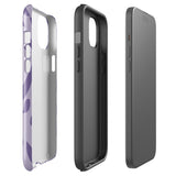 The Luna Morada for iPhone by Statement Cases is a durable phone case with a purple protective exterior featuring abstract dark purple and lavender patterns. The design includes geometric shapes and curves, giving it a modern artistic look. Made from impact-resistant polycarbonate, the lower part of the case prominently displays "STATEMENT CASES.