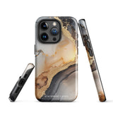 A smartphone with a sleek, marbled design case featuring swirls of gold, beige, and dark grey colors. The camera lenses on the back of the iPhone 15 Pro Max are clearly visible, and the protective Lunar & Gold Marble for iPhone case is branded with "Statement Cases" at the bottom.