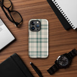 A smartphone with a beige and green plaid-patterned, impact-resistant polycarbonate case is shown. The phone’s rear camera lenses are prominently visible at the top left. The durable phone case features the words “Statement Cases” printed in small text at the bottom center. This is the Elegant Plaid for iPhone.