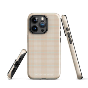 A smartphone with a plaid design case is displayed. The durable phone case features a beige and light brown checked pattern. The phone's camera lenses are visible at the top left corner. With dual-layer protection, the bottom of the impact-resistant polycarbonate Sophisticated Plaid for iPhone case reads "Statement Cases" in white.