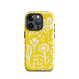 The Sol Dorado for iPhone by Statement Cases is a smartphone with a yellow case featuring a white, abstract floral and plant pattern. The camera lenses are prominent in the top left corner of the device. With dual-layer protection and impact-resistant TPU lining, "Statement Cases" is printed at the bottom of the case.