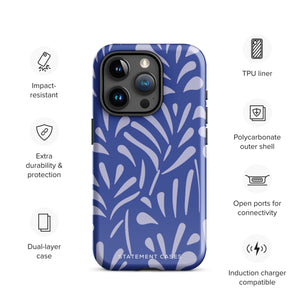 An iPhone encased in the "Mariposa Azul" by Statement Cases, featuring a blue design with an abstract white leaf pattern. The case combines curved and pointed shapes and provides dual-layer protection with TPU lining and impact-resistant polycarbonate. Camera lenses and other top elements remain unobstructed, and "Statement Cases" is inscribed at the bottom.