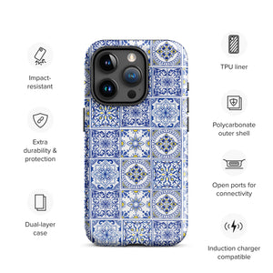 The Lisboa Azul for iPhone by Statement Cases is a smartphone adorned with a dual-layer protection phone case, featuring an intricate blue and white tile pattern. The design showcases various geometric and floral motifs, forming a visually appealing mosaic effect. The impact-resistant camera lenses and flash are prominently visible at the top left.