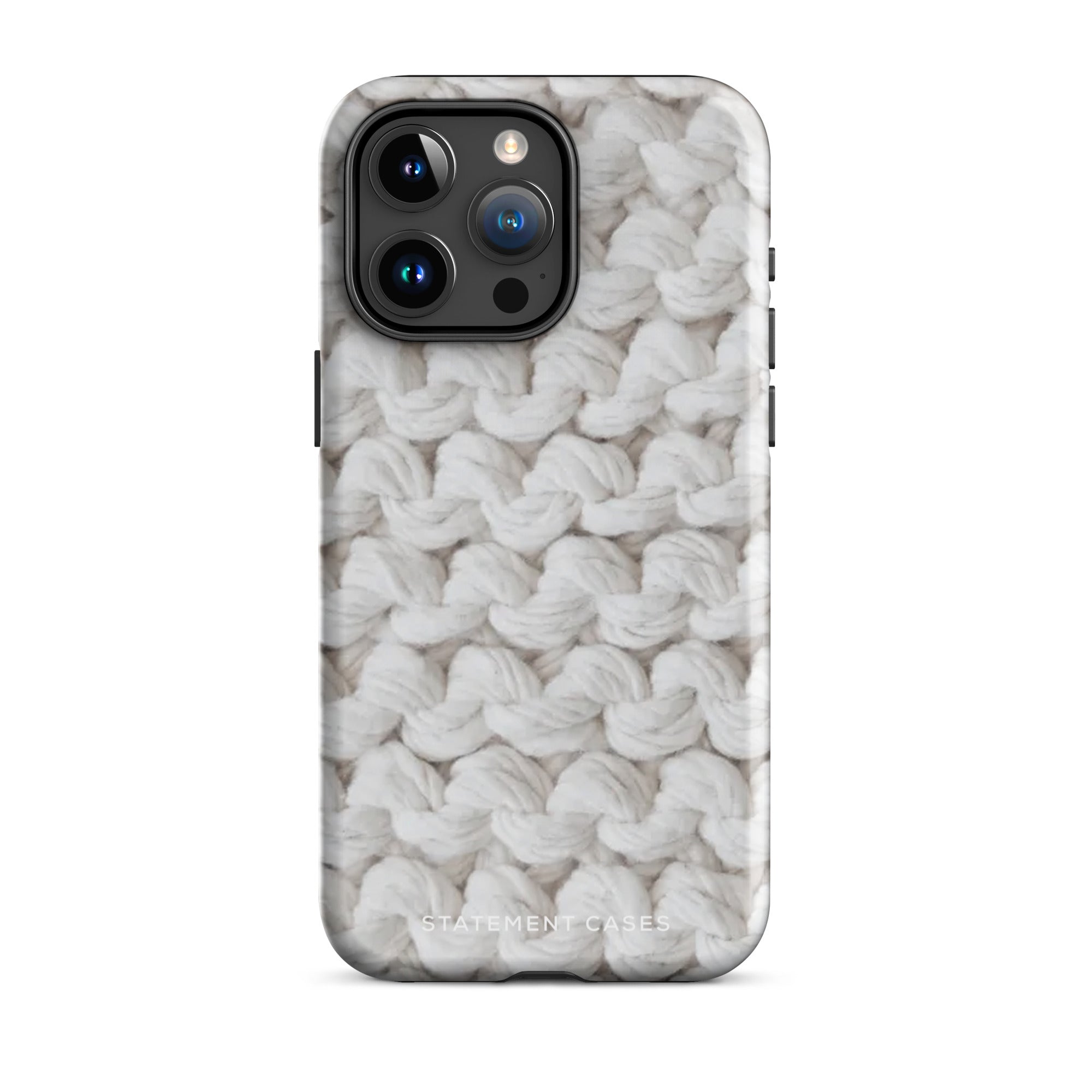 A smartphone featuring a knitted texture design on its case. The pattern resembles closely woven white yarn. The camera lenses are prominent at the top left corner, perfect for the Chunky Comfort for iPhone. The brand name "Statement Cases" is subtly printed at the bottom, ensuring it's both stylish and a protective iPhone case.