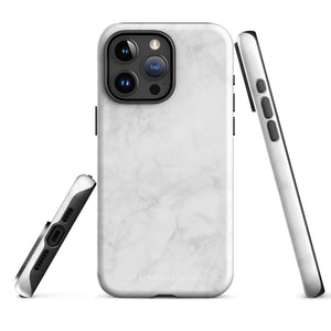 A protective iPhone case with a white marble-patterned design featuring three camera lenses and a flash. The marble pattern on this Marble Dreams for iPhone 15 Pro Max case is subtle, with light gray veining. The brand "Statement Cases" is subtly engraved at the bottom of the case.