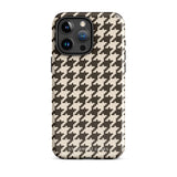 A Timeless Houndstooth for iPhone with a dual-camera system is encased in an impact-resistant polycarbonate, houndstooth-patterned case. The black and beige design features the brand name "Statement Cases" printed at the bottom, ensuring both style and dual-layer protection for your device.