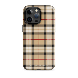 A Neutral Heritage Tartan for iPhone by Statement Cases with a plaid-patterned, impact-resistant polycarbonate case featuring beige, black, white, and red stripes. The durable phone case has the text "STATEMENT CASES" written at the bottom. The phone boasts a triple camera setup with an additional sensor and flash.