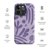 The Luna Morada for iPhone by Statement Cases is a durable phone case with a purple protective exterior featuring abstract dark purple and lavender patterns. The design includes geometric shapes and curves, giving it a modern artistic look. Made from impact-resistant polycarbonate, the lower part of the case prominently displays "STATEMENT CASES.