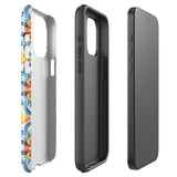 Statement Cases' Mediterranean Bloom for iPhone is showcased, featuring an intricate, colorful pattern. The design includes blue, yellow, and orange floral shapes in a symmetrical arrangement on a light blue background. This durable phone case provides dual-layer protection and is constructed from impact-resistant polycarbonate to safeguard your device.