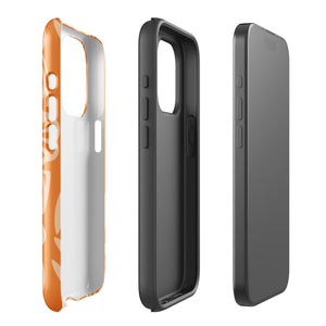 A Savannah Ardiente for iPhone from Statement Cases, featuring a dual-layered phone case in orange with a floral pattern showcasing cream-colored flowers, leaves, and geometric shapes. This impact-resistant polycarbonate case displays "STATEMENT CASES" at the bottom and reveals the camera lenses at the top left corner.