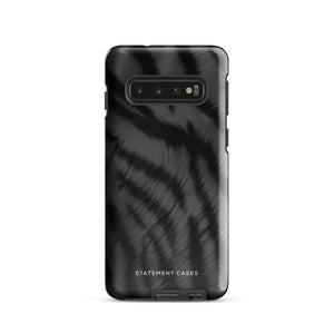 A tough smartphone with a black, textured case that has a silky, animal fur pattern. The dual-layer phone case has cutouts for the camera and side buttons, and the words "Statement Cases" are printed near the bottom.