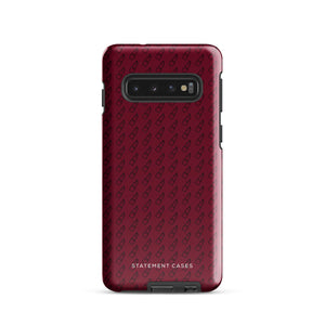 A Rockstar Red for Samsung, shock-absorbing phone case by Statement Cases for a multi-lens smartphone, featuring a subtle pattern of small phone cases with glasses and the brand name "Statement Cases" imprinted at the bottom. The impact-resistant phone case is displayed against a plain white background.