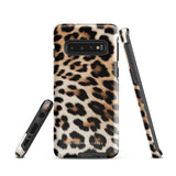 A tough phone case with a leopard print design is displayed. The dual-layer design features black and brown spots on a tan background, mimicking leopard fur. The text "Statement Cases" is printed on the lower part of the impact-resistant case. This is the Mighty Jaguar Fur for Samsung by Statement Cases.