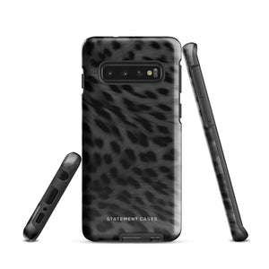 A Nocturnal Hunter Fur for Samsung with a black and gray leopard print phone case featuring a dual-layer design. The camera module has five lenses and a flash. The text "STATEMENT CASES" is written at the bottom of this impact-resistant case.