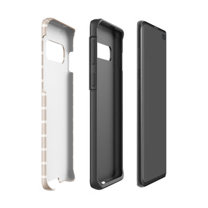 Three items are displayed, each slightly separated for clarity. From left to right: a white Au Naturale for Samsung by Statement Cases, a black shock-absorbing phone case, and a smartphone with a dark screen. The white Au Naturale for Samsung by Statement Cases is open from the backside, while the black case is enclosed with side buttons.