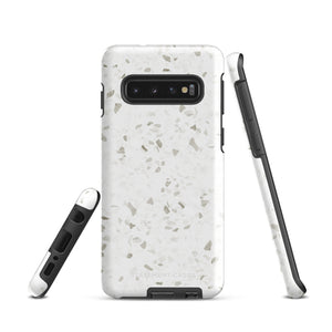 A Terrazzo Chic for Samsung with a rectangular off-white and gray terrazzo patterned case. The durable phone case by Statement Cases features three prominent buttons on the side and five camera lens openings on the back. The words "Statement Cases" are faintly visible at the bottom, highlighting its dual-layer protection.