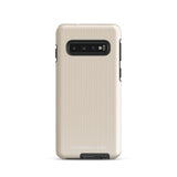 A beige smartphone case with vertical stripes designed for a phone with a triple camera setup. This impact-resistant phone case features precise cutouts for the cameras, buttons, and other essential functions. "Statement Cases" is printed at the bottom of the tough phone case. Product Name: Noble Pinstripe for Samsung