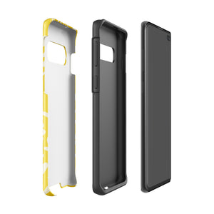 The Sol Dorado for Samsung by Statement Cases is a durable phone case featuring a bright yellow background adorned with an abstract white floral pattern, showcasing various flowers and leaves. Near the bottom edge, the text "STATEMENT CASE" highlights its dual-layer design for enhanced durability.