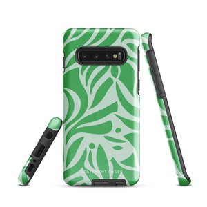 The Selva Verde for Samsung, a product by Statement Cases, is a durable, dual-layer phone case adorned with a green and white leafy design. The back of the case includes a camera cutout, and the bottom is printed with "Statement Cases.