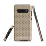 A stylish beige, shock-absorbing phone case with a perforated pattern, designed for a phone with four camera lenses. The dual-layer case has a textured surface and precise cutouts for the camera and buttons. The brand name "Statement Cases" is visible at the bottom of the impact-resistant Delicate Elegance for Samsung.