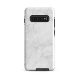 A dual-layer design smartphone case with a white marble pattern features three large camera lenses and a smaller one on the back. "Statement Cases" is subtly printed near the bottom. The minimalistic, matte finish offers impact-resistant protection with style.