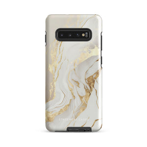 A Golden Elegance for Samsung is encased in a decorative, impact-resistant phone case with a marble-like design featuring white, beige, and gold swirls. The tough phone case covers the back and sides, with precise cutouts for the four-lens camera and buttons. The brand "Statement Cases" is printed at the bottom.