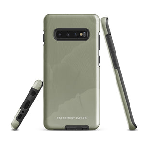 A Pistachio Haze for Samsung with a green phone case featuring a subtle floral pattern. This tough phone case has cutouts for three cameras and a flash, with the brand name "Statement Cases" printed at the bottom. The side buttons are visible, and there's a port at the bottom for easy access.