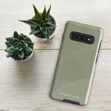 A Pistachio Haze for Samsung with a green phone case featuring a subtle floral pattern. This tough phone case has cutouts for three cameras and a flash, with the brand name "Statement Cases" printed at the bottom. The side buttons are visible, and there's a port at the bottom for easy access.