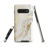 A Golden Elegance for Samsung is encased in a decorative, impact-resistant phone case with a marble-like design featuring white, beige, and gold swirls. The tough phone case covers the back and sides, with precise cutouts for the four-lens camera and buttons. The brand "Statement Cases" is printed at the bottom.