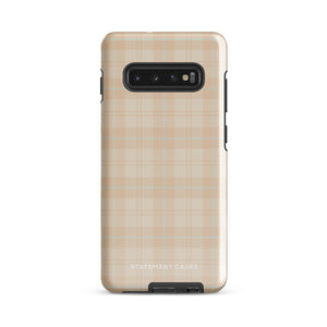 A smartphone with an impact-resistant beige plaid phone case featuring subtle light blue accents. The camera, flash, and sensor modules are visible at the top. The bottom part of the case has the text "Sophisticated Plaid for Samsung" printed on it by Statement Cases.