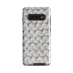 A Chunky Comfort for Samsung with a realistic knitted texture featuring white interwoven yarns. The impact-resistant case has multiple camera cutouts and a shock-absorbing dual-layer design. The brand name "Statement Cases" is printed at the bottom.