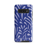 The Mariposa Azul for Samsung smartphone case from Statement Cases is adorned with an impact-resistant design featuring light purple abstract shapes on a blue background. This dual-layer case proudly displays the text "STATEMENT CASES" at the bottom, ensuring that the camera lenses and buttons of your phone remain clearly visible.