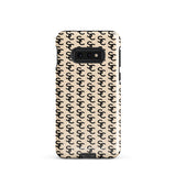 A beige smartphone case with a repeating black double-C logo pattern. The back of the impact-resistant phone case features camera cutouts aligned on the left side, accommodating what appears to be a multi-lens camera system. This is the Heritage Monogram for Samsung by Statement Cases.