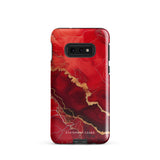 A red and black Scarlet Marble for Samsung with a marble-like pattern and gold accents, designed for a phone with multiple rear cameras. This tough phone case features an impact-resistant, dual-layer design and showcases the brand name "Statement Cases" near the bottom.