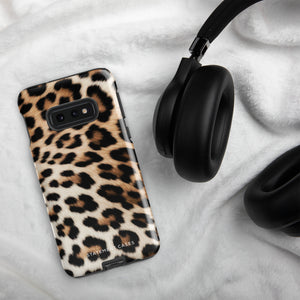 A tough phone case with a leopard print design is displayed. The dual-layer design features black and brown spots on a tan background, mimicking leopard fur. The text "Statement Cases" is printed on the lower part of the impact-resistant case. This is the Mighty Jaguar Fur for Samsung by Statement Cases.