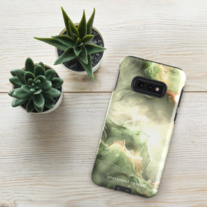 A smartphone with a glossy, abstract green and gold phone case featuring swirling marble patterns. The dual-layer design ensures it is impact-resistant. The case is labeled "Statement Cases" at the bottom. The phone has a prominent camera module with four lenses and a flash on the top left corner, encased in the Sleek Sage for Samsung by Statement Cases.
