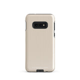 A beige smartphone case with vertical stripes designed for a phone with a triple camera setup. This impact-resistant phone case features precise cutouts for the cameras, buttons, and other essential functions. "Statement Cases" is printed at the bottom of the tough phone case. Product Name: Noble Pinstripe for Samsung