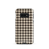 A Statement Cases Timeless Houndstooth for Samsung featuring a black and beige houndstooth pattern. The camera cutout at the top rear is designed for a triple-lens camera. With its dual-layer design and slim profile, this impact-resistant case also boasts a glossy finish.