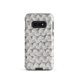 A Chunky Comfort for Samsung with a realistic knitted texture featuring white interwoven yarns. The impact-resistant case has multiple camera cutouts and a shock-absorbing dual-layer design. The brand name "Statement Cases" is printed at the bottom.