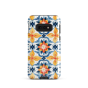 The Mediterranean Bloom for Samsung by Statement Cases features intricate, colorful floral patterns in blue, orange, and yellow. The design covers the entire back of the case, surrounding the camera cutout. Shock-absorbing and impact-resistant, it ensures protection while the brand "Statement Cases" is subtly printed near the bottom.