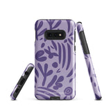 Introducing the Luna Morada for Samsung, a striking smartphone case from Statement Cases. This decorative purple cover boasts abstract floral and organic patterns in darker hues and is designed to absorb shocks. The impact-resistant case features a camera cutout that accommodates five lenses, with the brand name "STATEMENT CASES" elegantly printed at the bottom center.