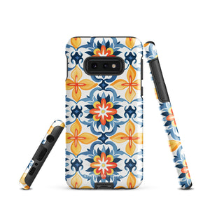 The Mediterranean Bloom for Samsung by Statement Cases features intricate, colorful floral patterns in blue, orange, and yellow. The design covers the entire back of the case, surrounding the camera cutout. Shock-absorbing and impact-resistant, it ensures protection while the brand "Statement Cases" is subtly printed near the bottom.