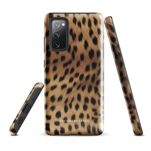 A smartphone with a leopard print, dual-layer design phone case featuring four camera lenses on the back is displayed against a white background. The bottom of the tough phone case has the brand name "Statement Cases" in white letters. The product name is "Daring Cheetah Fur for Samsung".