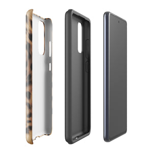 A smartphone with a leopard print, dual-layer design phone case featuring four camera lenses on the back is displayed against a white background. The bottom of the tough phone case has the brand name "Statement Cases" in white letters. The product name is "Daring Cheetah Fur for Samsung".