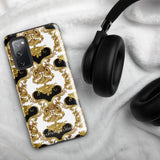 A phone case with an ornate Baroque-style design, featuring an intricate pattern of gold and black swirls and vines on a white background. This dual-layer design is not only impact-resistant but also stylish. The camera cutout is large and accommodates multiple lenses, with "Rebellious Spirit for Samsung" displayed at the bottom.