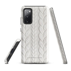 A stylish, impact-resistant phone case with a textured white braided design, covering the back of a smartphone. The dual-layer design features cutouts for the camera and buttons, and "Cozy Knit Bliss for Samsung" by Statement Cases is embossed at the bottom.