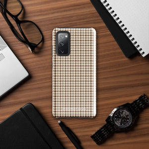 A Samsung smartphone with a beige and brown houndstooth patterned, impact-resistant case from Statement Cases. The phone features multiple cameras on the upper left side of its back. This tough Classic Houndstooth for Samsung phone case has a sleek, dual-layer design with precise cutouts for the cameras and buttons.